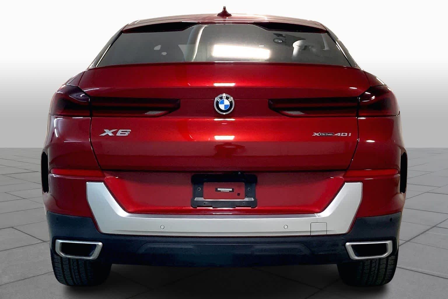 Used 2021 Flamenco Red Metallic BMW xDrive40i image 4
