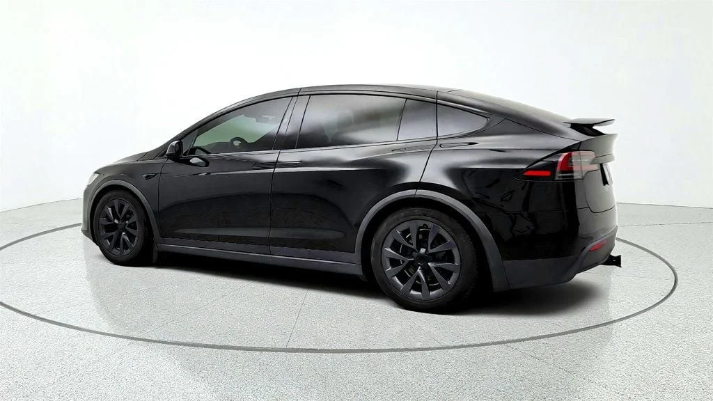 Used 2023 Solid Black Tesla AWD image 7