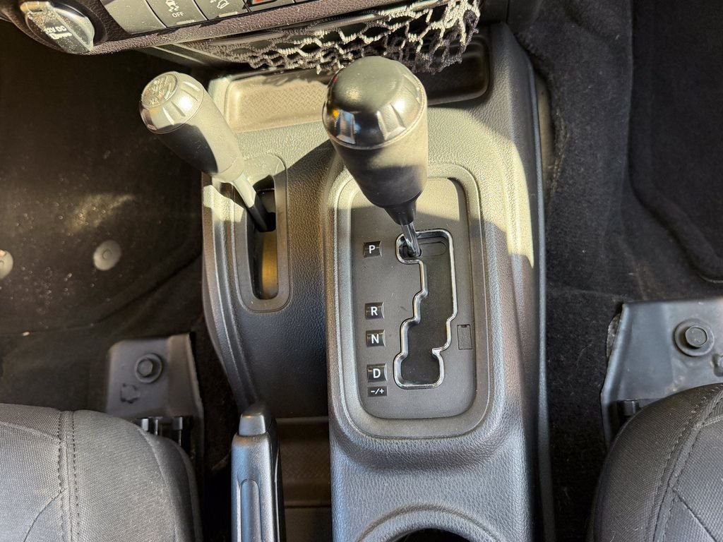 Used 2016 Granite Crystal Clearcoat Metallic Jeep Unlimited Sport image 15