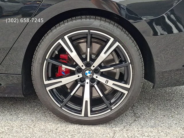 Used 2026 Black Sapphire Metallic BMW 550e xDrive image 8