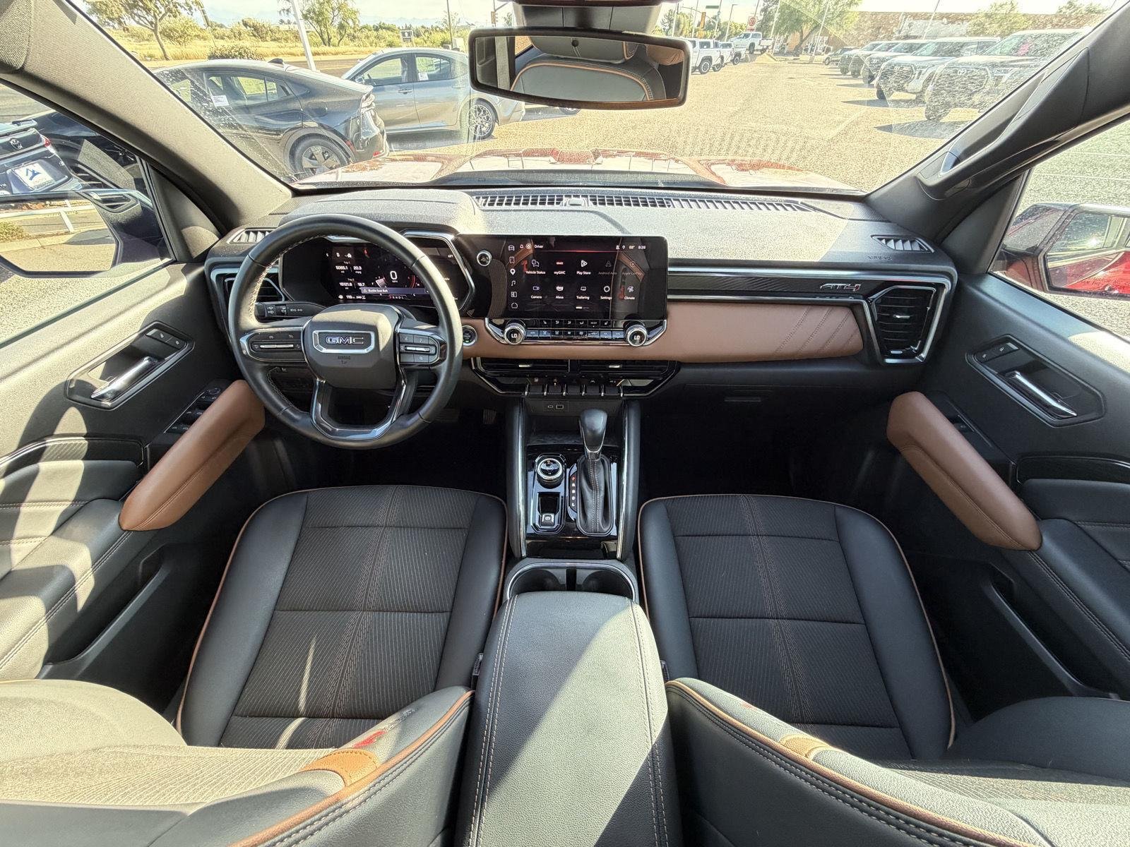 Used 2025 Volcanic Red Tintcoat GMC 4WD AT4 image 23