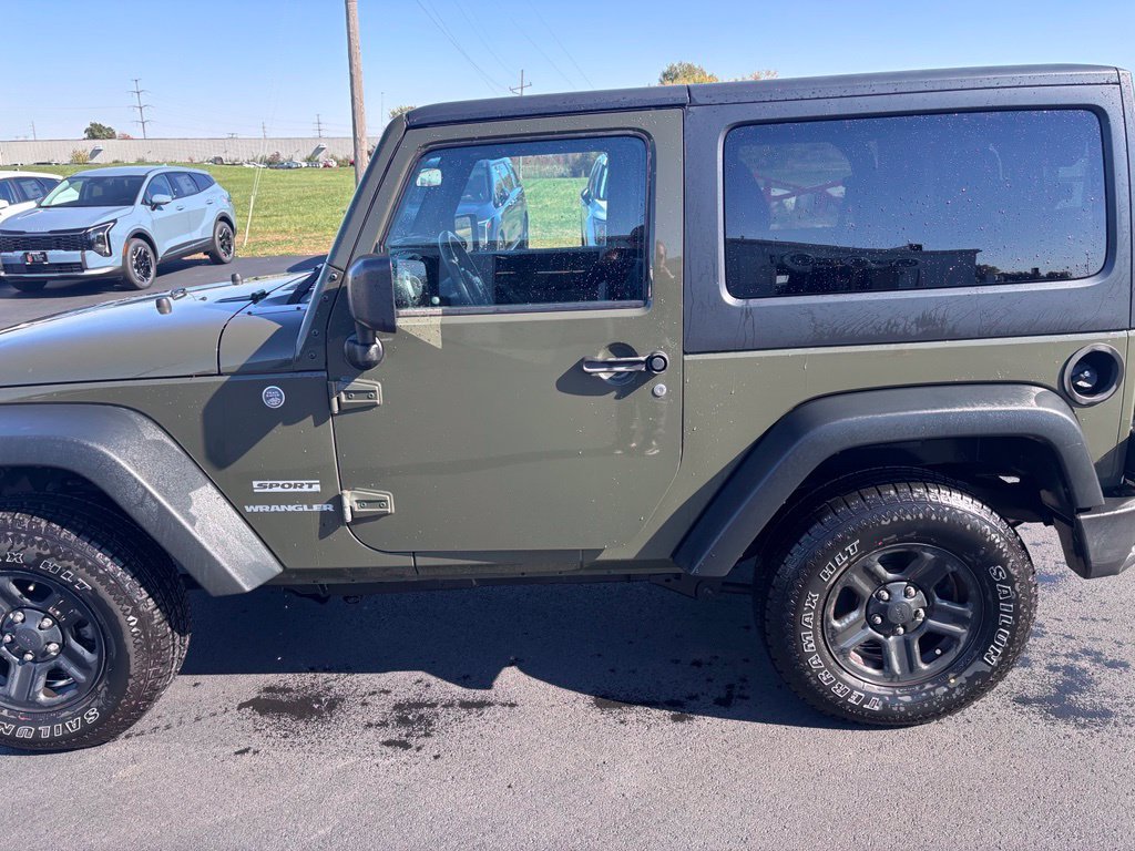Used 2015 Tank Clearcoat Jeep Sport image 8