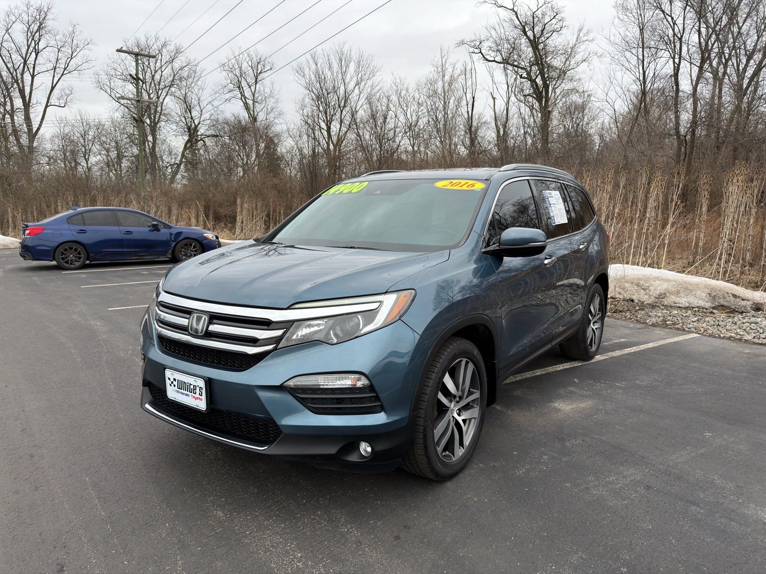 Used 2016 Honda Pilot Touring with VIN 5FNYF6H93GB058624 for sale in Lima, OH