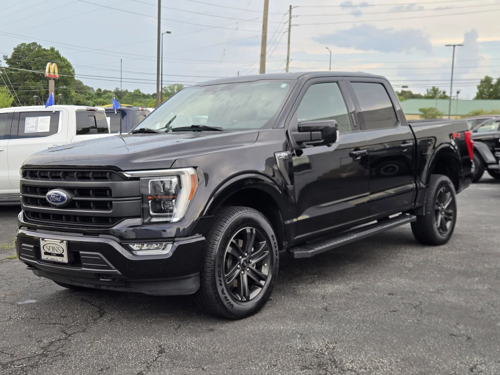 Used 2021 Black Metallic Ford Lariat image 2