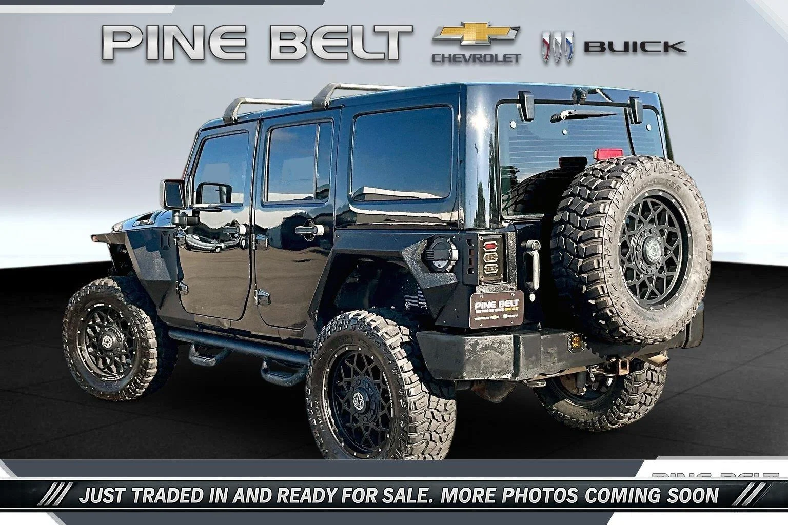 Used 2013 Black Jeep Sport image 2