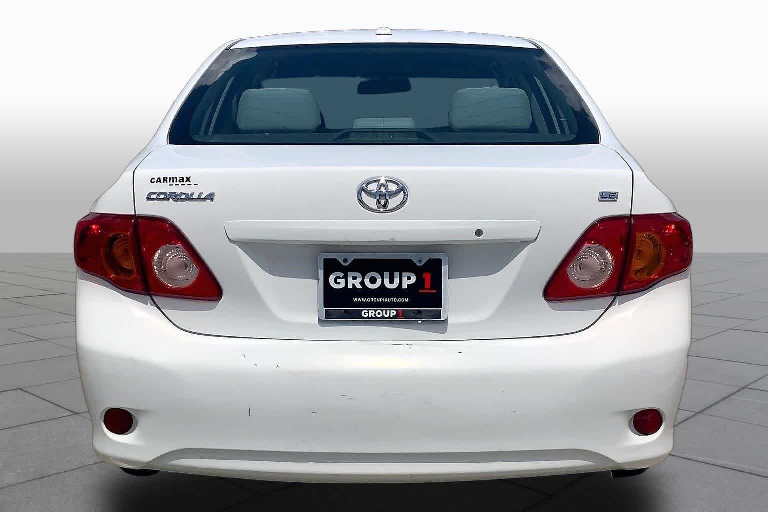 Used 2010 Super White Toyota LE image 4