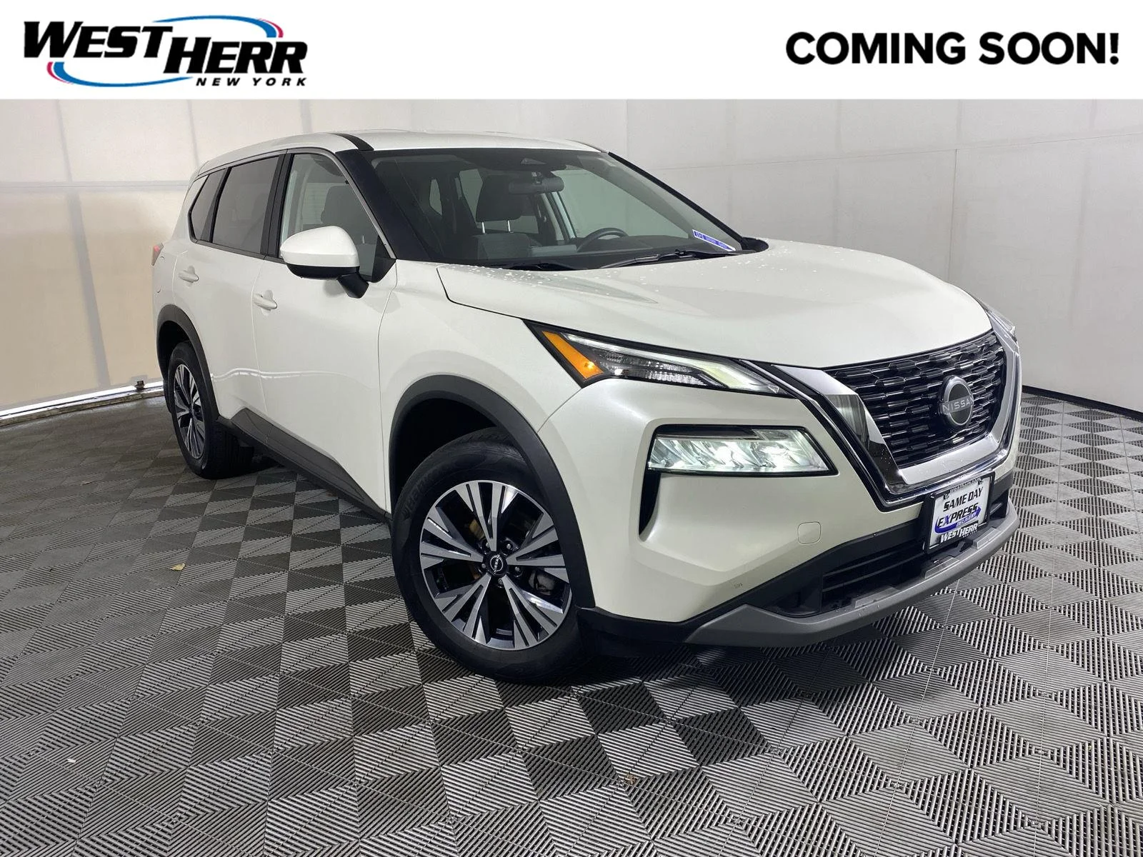Used 2023 Pearl White Tricoat Nissan SV image 1