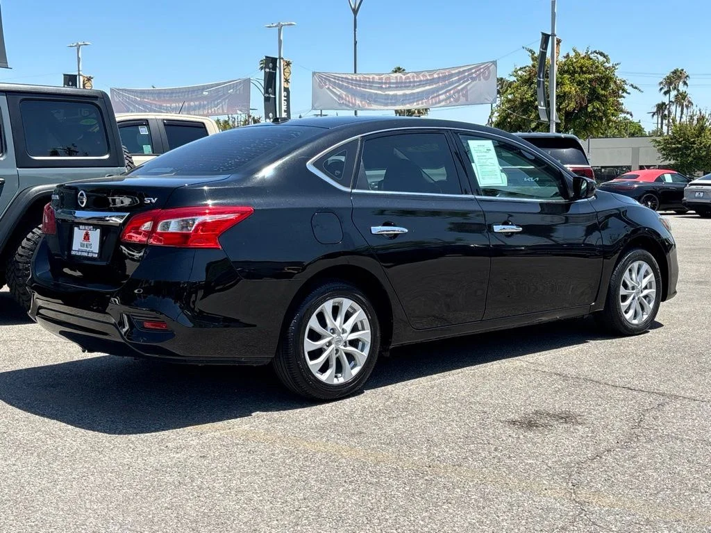 Used 2019 Black Nissan SV image 4