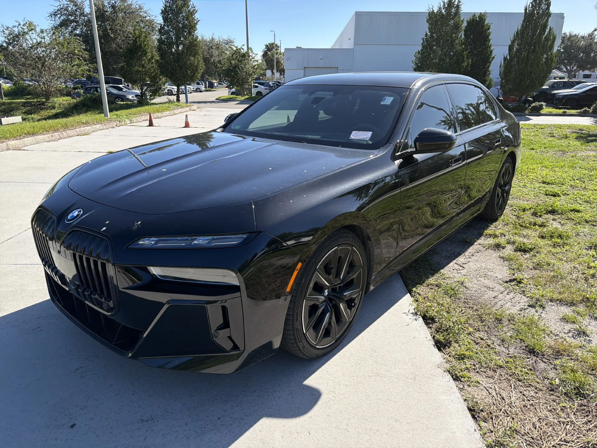 Certified Used 2024 Black Sapphire Metallic BMW xDrive60 image 8