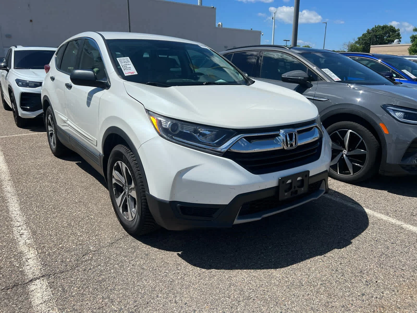 Used 2018 Honda CR-V LX with VIN 5J6RW6H35JL001467 for sale in Brooklyn Center, Minnesota