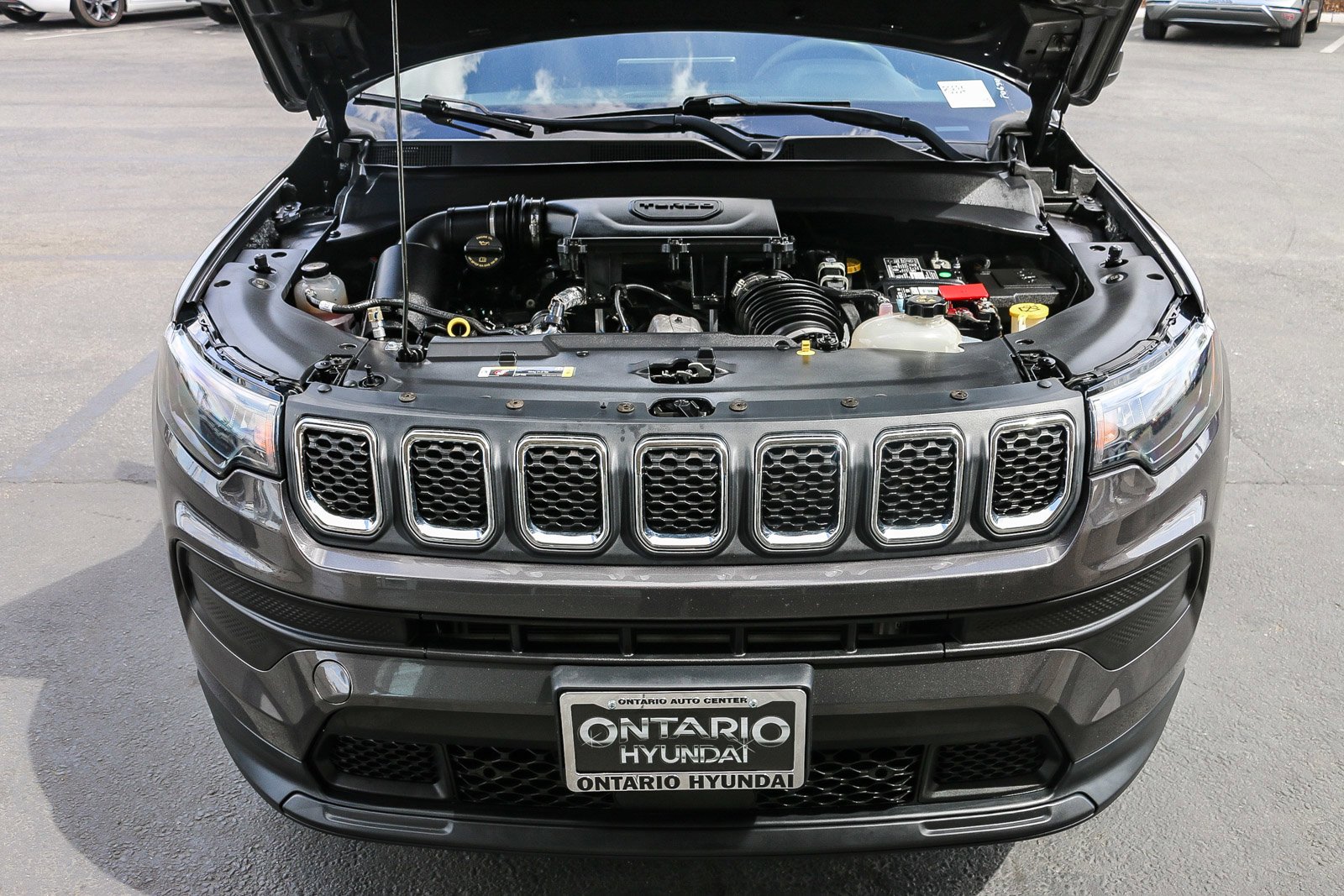 Used 2023 Granite Crystal Metallic Clearcoat Jeep Sport image 28