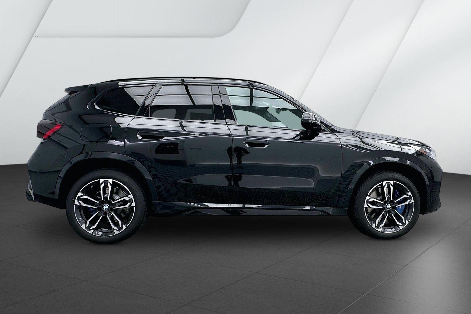 New 2026 Black Sapphire Metallic BMW M35i image 5