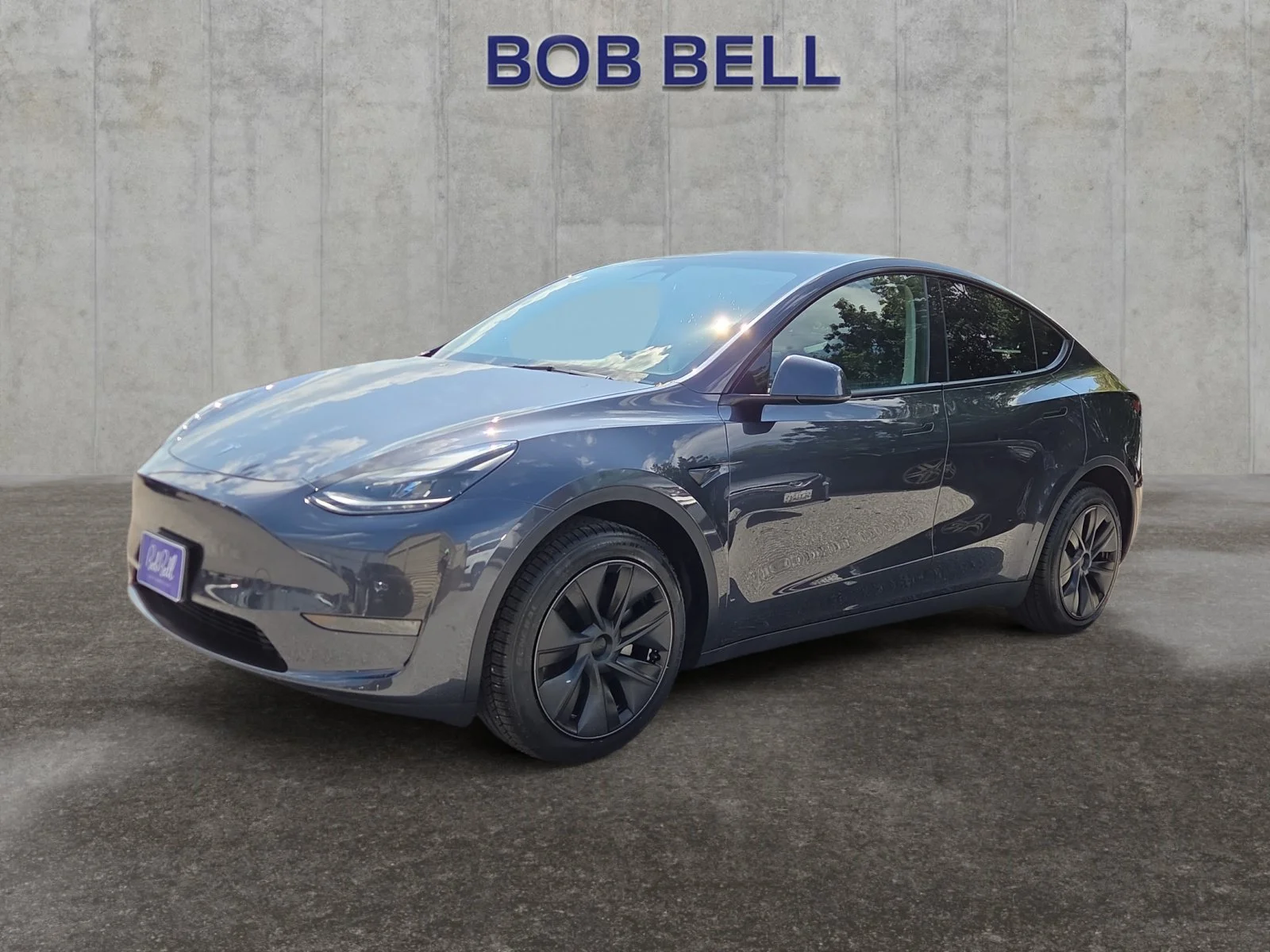 Used 2025 Stealth Gray Tesla Long Range image 1
