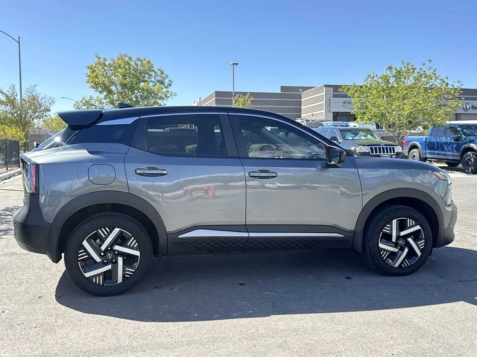 Used 2025 Gun Metallic/Super Black Nissan SV image 9