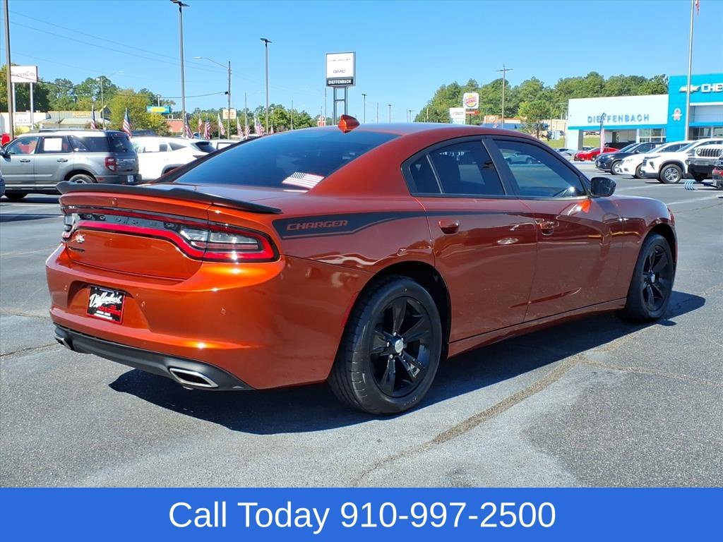 Used 2023 Orange Dodge SXT image 5