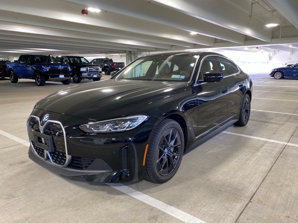 Used 2023 Jet Black BMW eDrive35 image 1