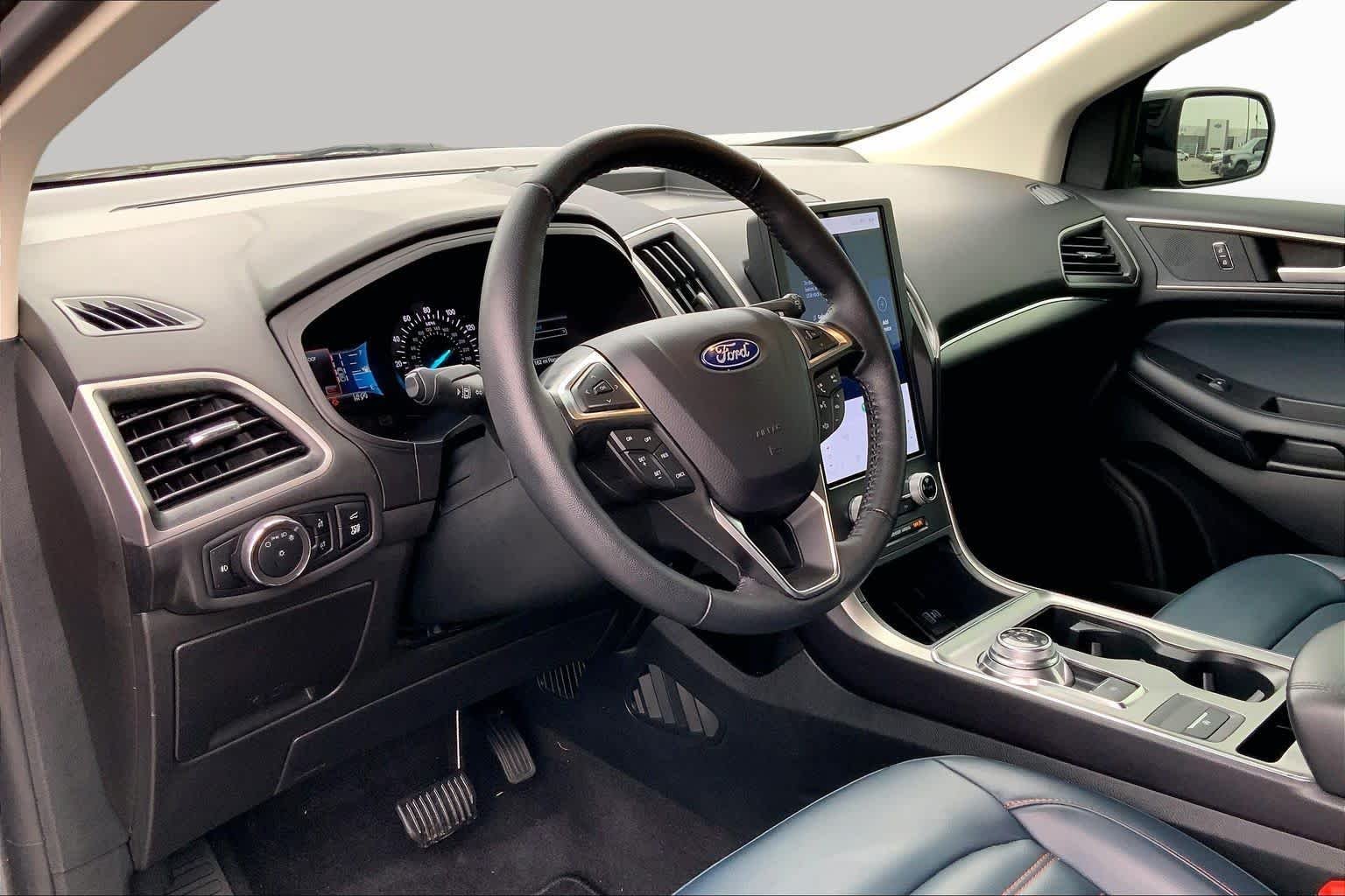 Used 2024 Carbonized Gray Metallic Ford SEL image 16