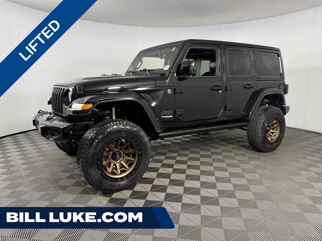 Used 2021 Black Jeep Unlimited Sahara High Altitude image 1