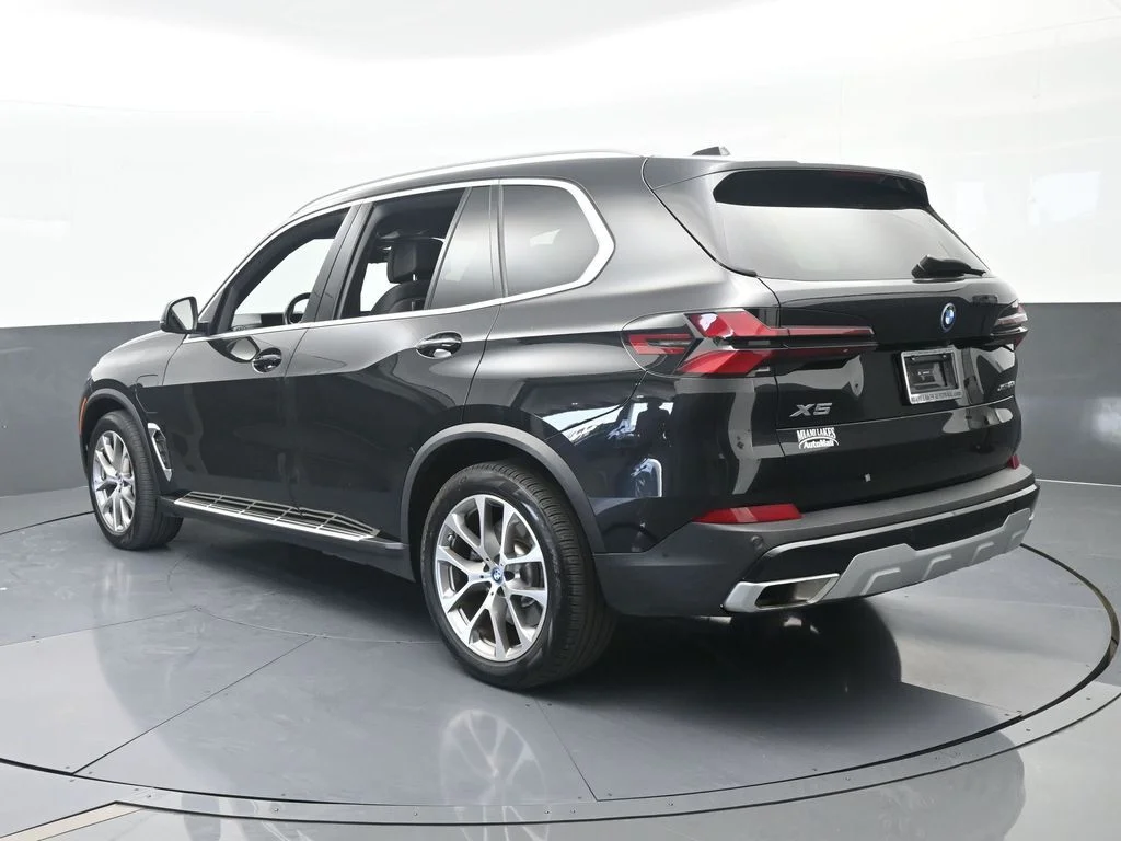 Used 2025 Black Sapphire Metallic BMW xDrive50e image 4