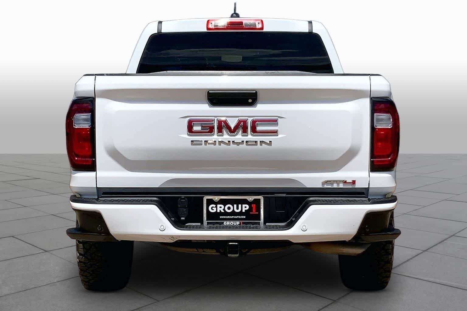 Used 2024 Summit White GMC 4WD AT4 image 7