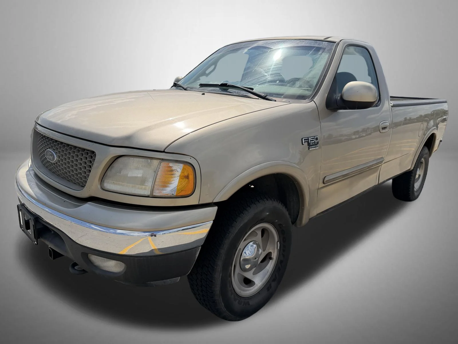 Used 2000 Gold Ford XLT image 1