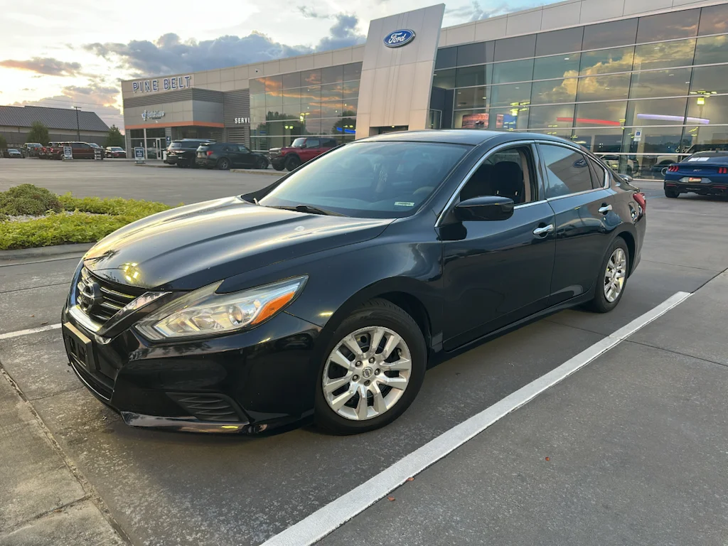 Used 2017 Super Black Nissan 2.5 S image 1