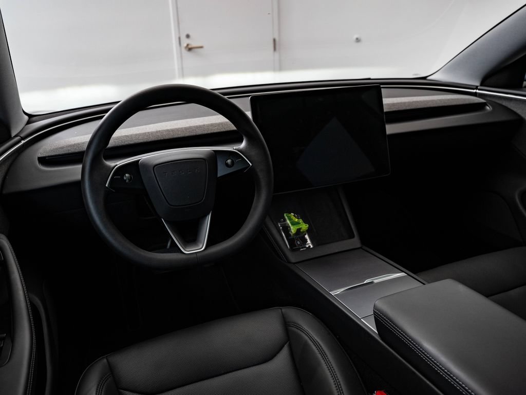 Used 2024 Stealth Gray Tesla  image 4