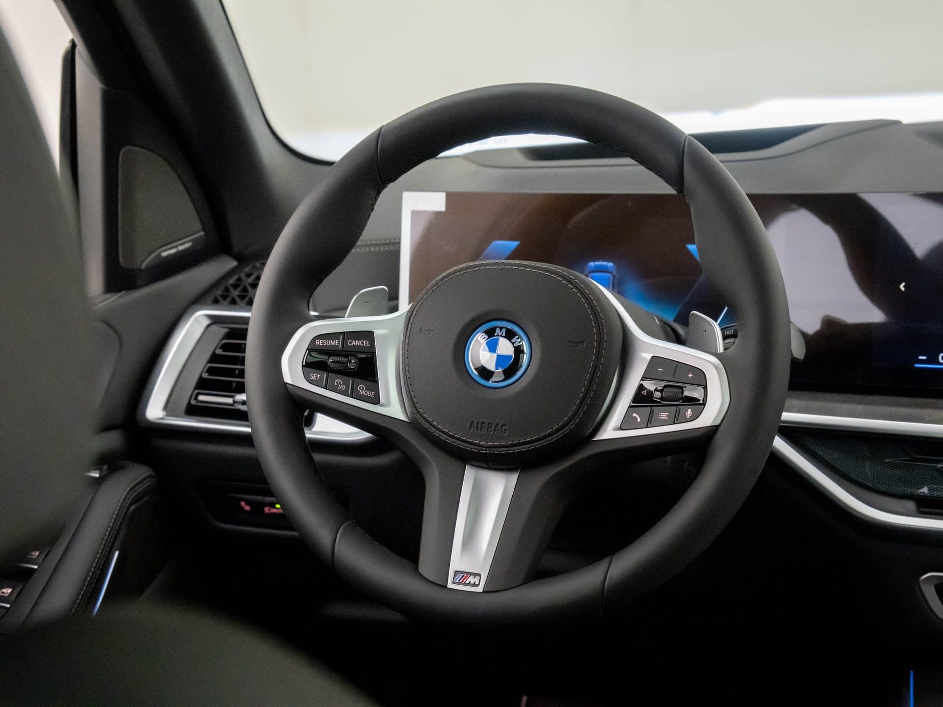 New 2026 Black Sapphire Metallic BMW xDrive50e image 11
