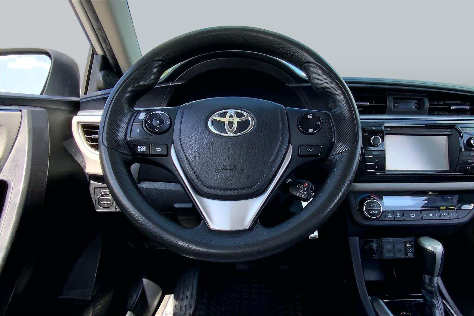 Used 2015 Super White Toyota LE image 6
