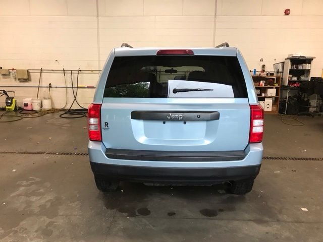 Used 2013 Beige Jeep Sport image 7