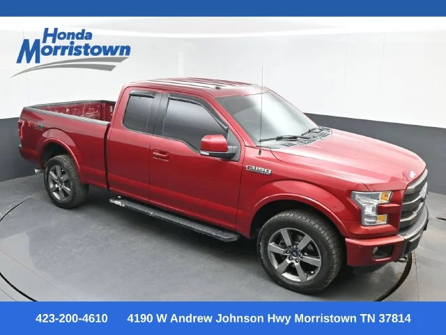 Used 2015 Ruby Red Metallic Ford Lariat image 1