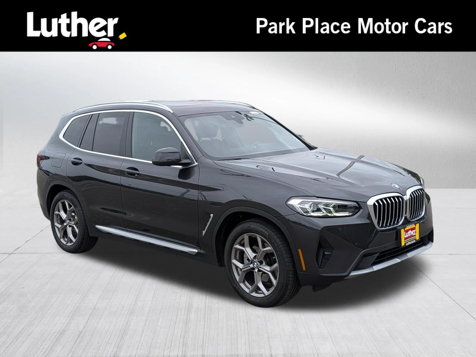 Used 2022 Dark Graphite Metallic BMW xDrive30i image 1