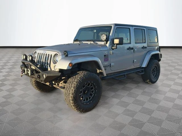 Used 2015 Silver Jeep Unlimited Sahara image 3