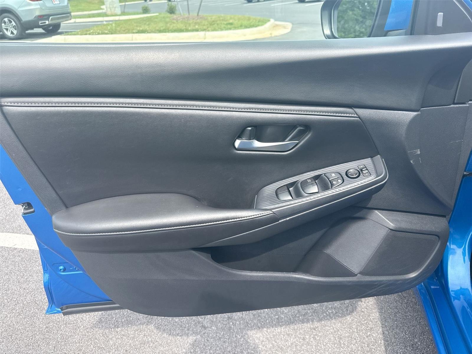 Used 2025 Electric Blue Metallic Nissan SV image 11