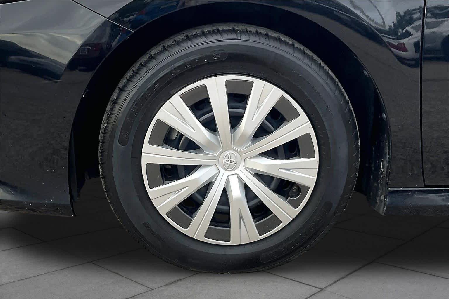 Used 2022 Midnight Black Metallic Toyota Hybrid LE image 11