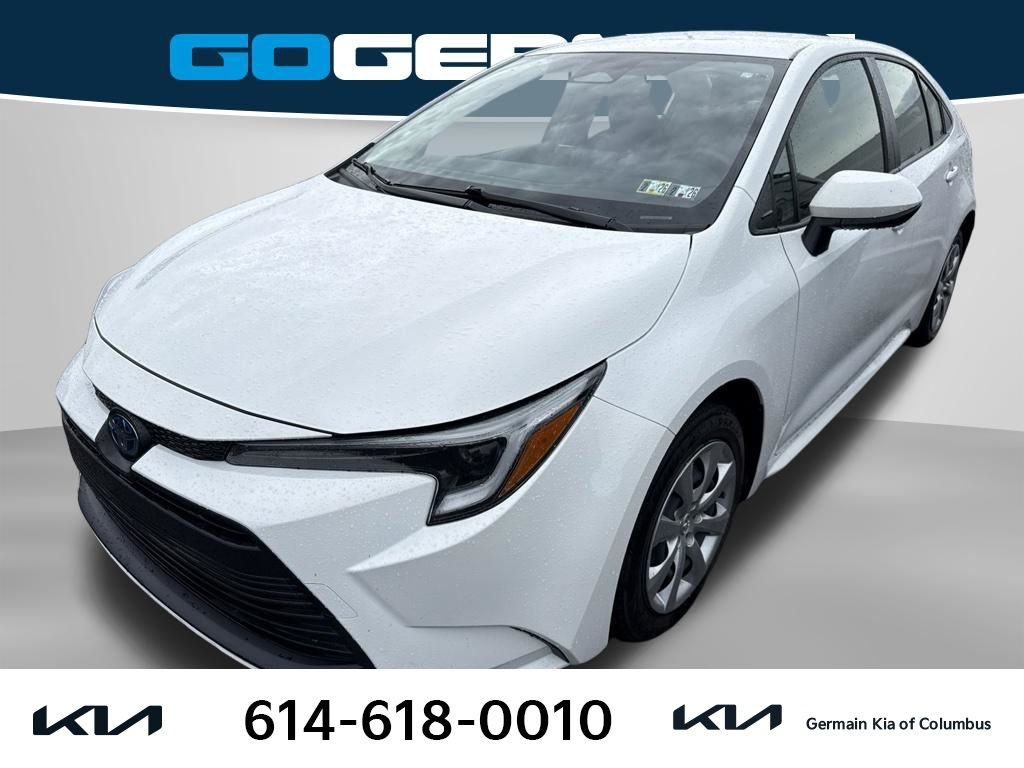 Used 2025 White Toyota LE image 1