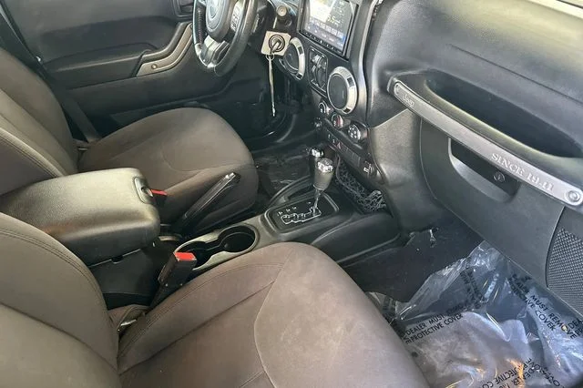 Used 2015 Black Clearcoat Jeep Unlimited Sport image 18
