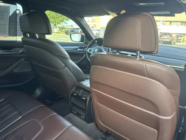 Used 2021 Dark Blue BMW M550i xDrive image 25