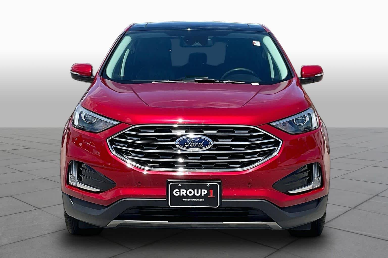 Used 2023 Rapid Red Metallic Tinted Clearcoat Ford Titanium image 4