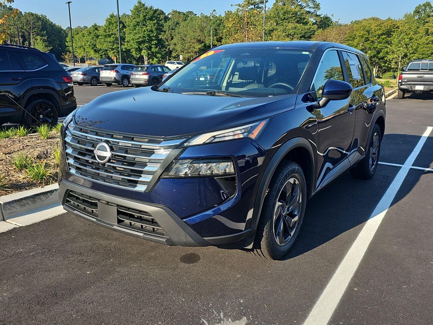 Used 2025 Deep Ocean Blue Pearl Nissan SV image 2
