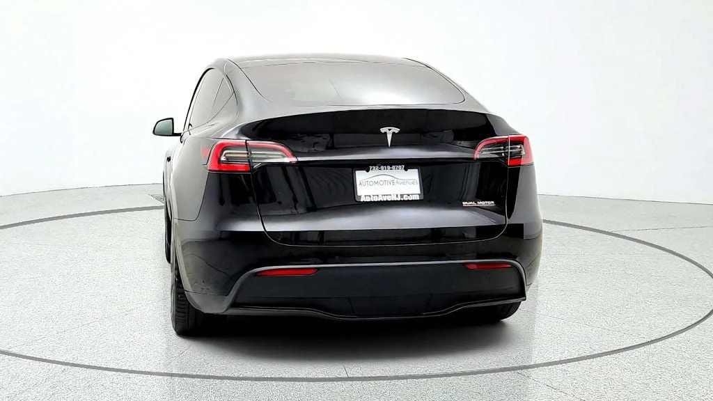Used 2021 Solid Black Tesla Performance AWD w/ White & Black Premium Interior image 6