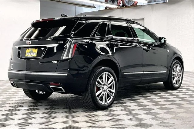 Used 2024 Stellar Black Metallic Cadillac Sport image 13