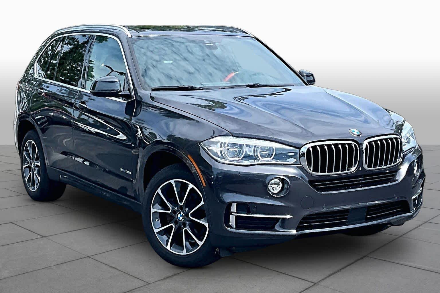 Used 2018 Dark Graphite Metallic BMW xDrive35i image 3