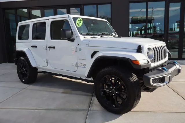 Used 2024 Bright White Clearcoat Jeep Sahara 4xe image 1