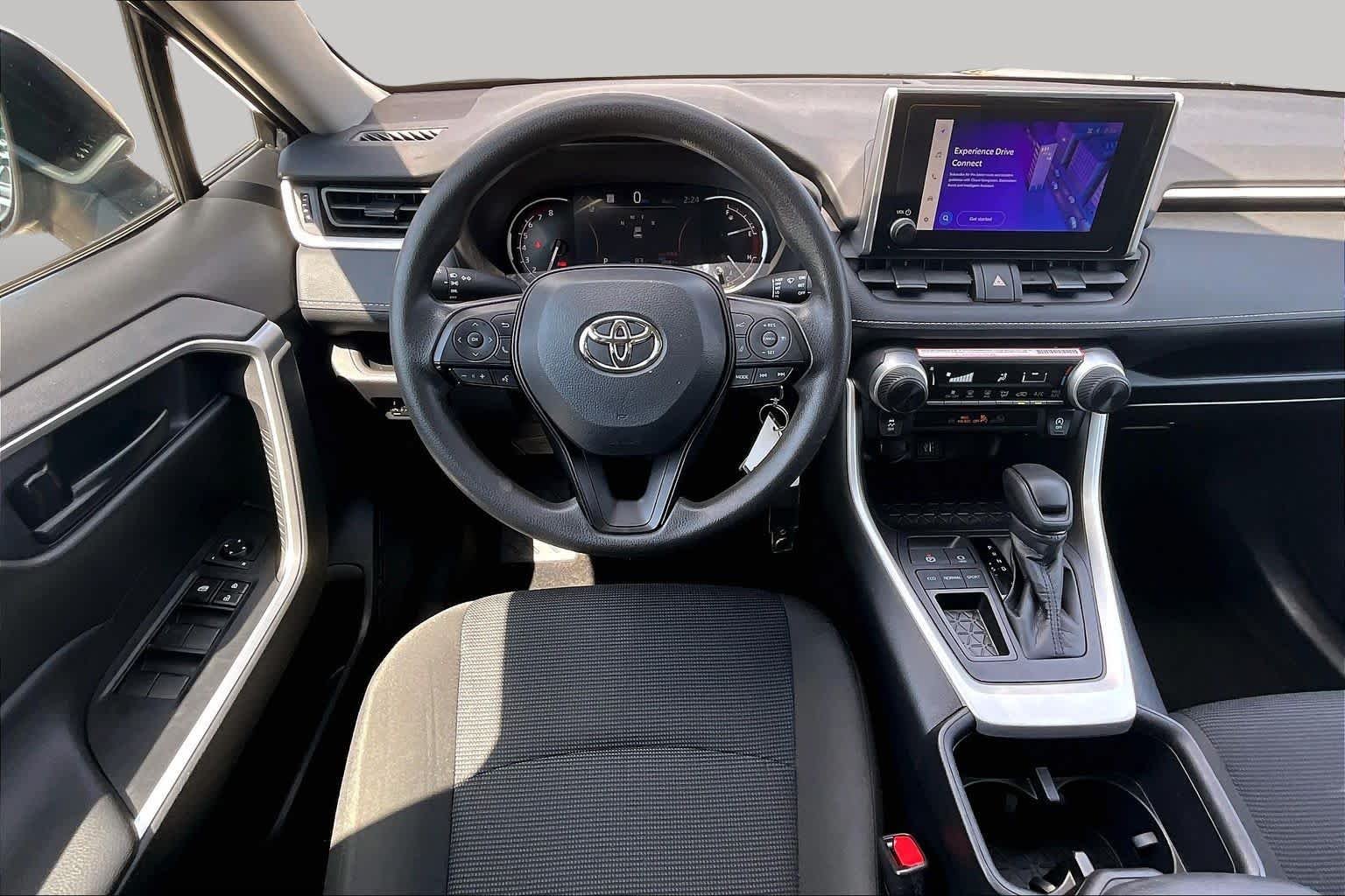 Used 2024 Magnetic Gray Metallic Toyota LE image 6
