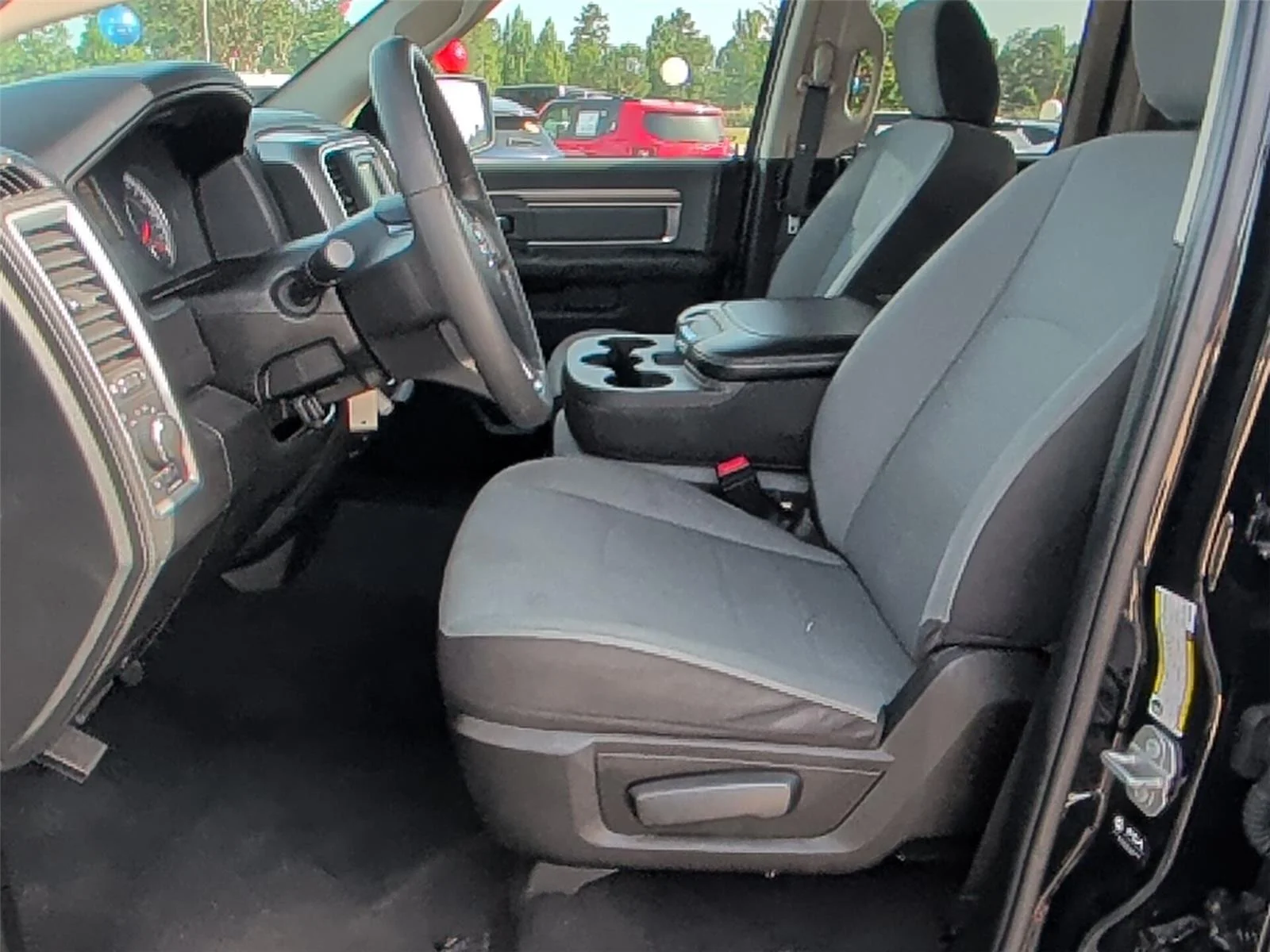 Used 2024 Diamond Black Crystal Pearlcoat Ram SLT image 11
