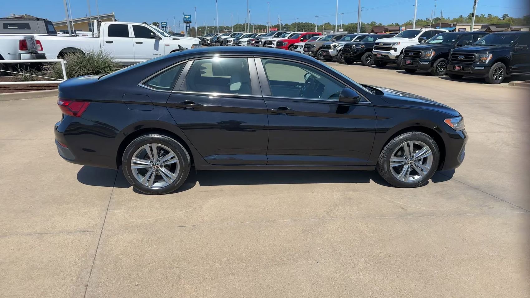 Used 2024 Black Volkswagen SE image 2