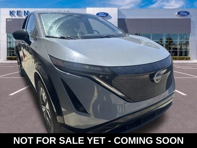 Used 2023 Gray Nissan ENGAGE e-4ORCE image 1