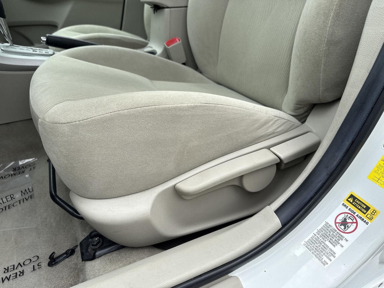 Used 2013 Super White Toyota LE image 16