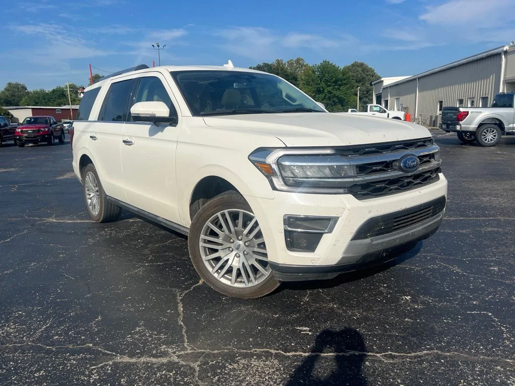 Used 2024 White Metallic Ford Limited image 1